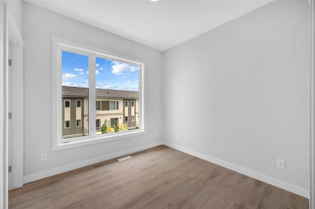 305 Shawnee Square Sw, Calgary, AB - Indoor Photo Showing Other Room