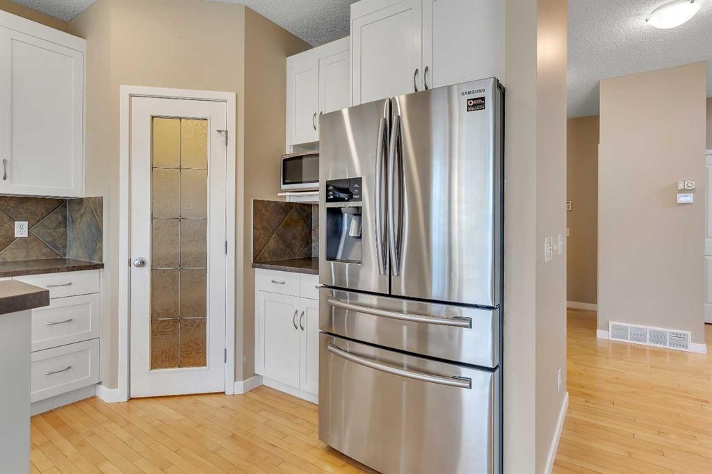 119 Valley Stream Circle Nw, Calgary, AB - Indoor Photo Showing Kitchen With Stainless Steel Kitchen