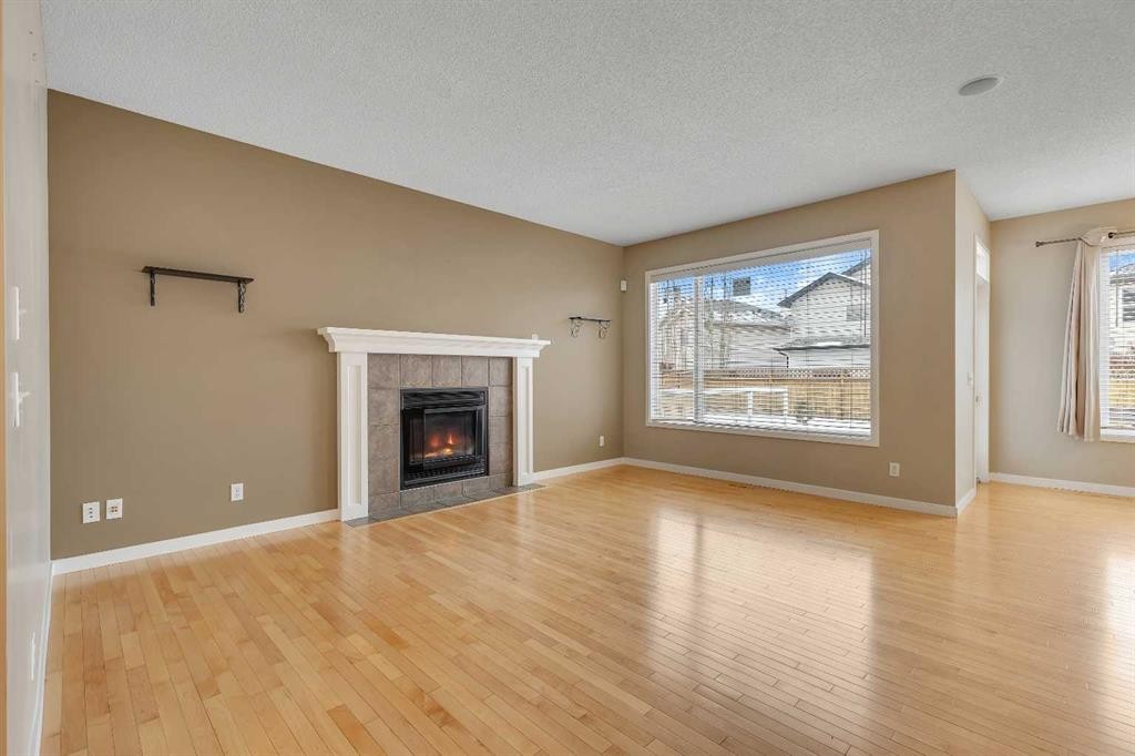 119 Valley Stream Circle Nw, Calgary, AB - Indoor Photo Showing Living Room With Fireplace