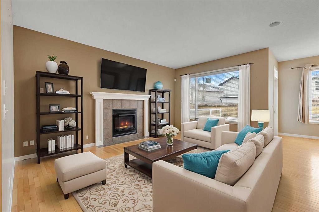 119 Valley Stream Circle Nw, Calgary, AB - Indoor Photo Showing Living Room With Fireplace