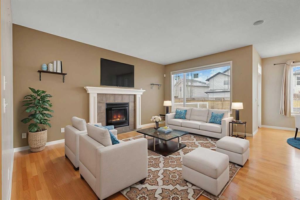 119 Valley Stream Circle Nw, Calgary, AB - Indoor Photo Showing Living Room With Fireplace