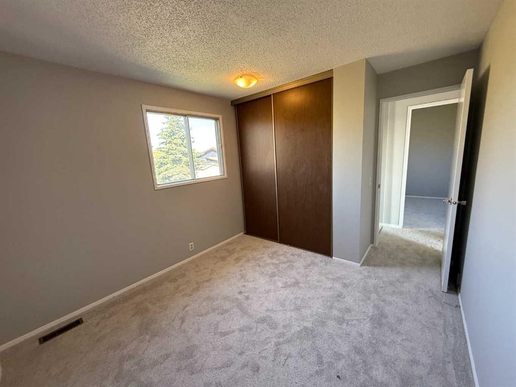 74 Aberdare Way Ne, Calgary, AB - Indoor Photo Showing Other Room