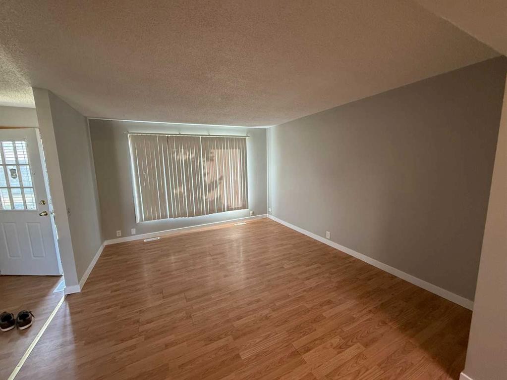 74 Aberdare Way Ne, Calgary, AB - Indoor Photo Showing Other Room