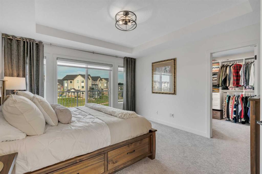 1315 Bayside Drive Sw, Airdrie, AB - Indoor Photo Showing Bedroom