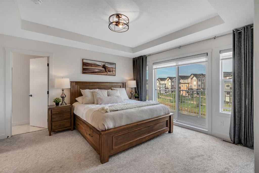 1315 Bayside Drive Sw, Airdrie, AB - Indoor Photo Showing Bedroom