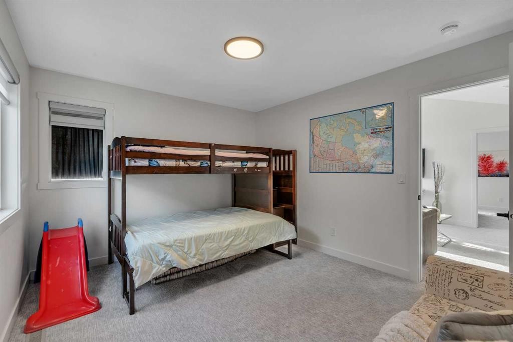 1315 Bayside Drive Sw, Airdrie, AB - Indoor Photo Showing Bedroom