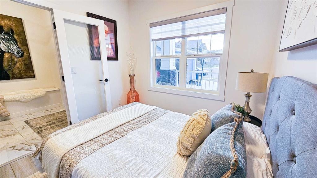 1315 Bayside Drive Sw, Airdrie, AB - Indoor Photo Showing Bedroom