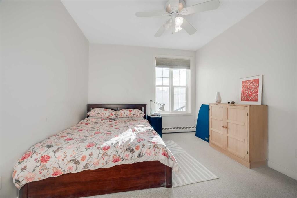 301-208 Holy Cross Lane Sw, Calgary, AB - Indoor Photo Showing Bedroom
