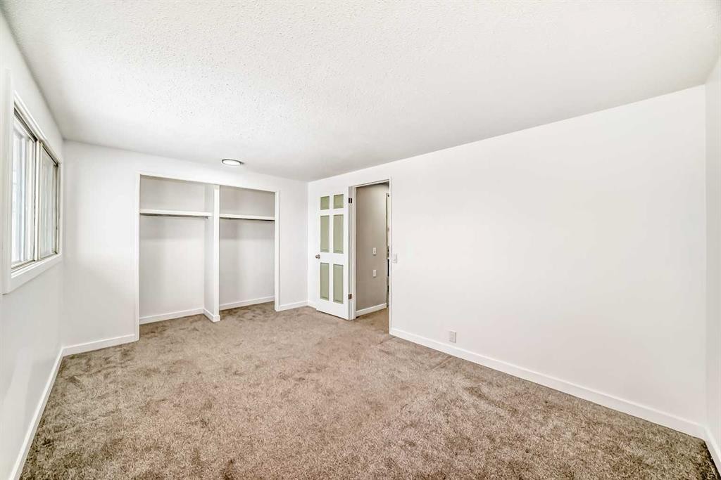 51A Fonda Green Se, Calgary, AB - Indoor Photo Showing Other Room
