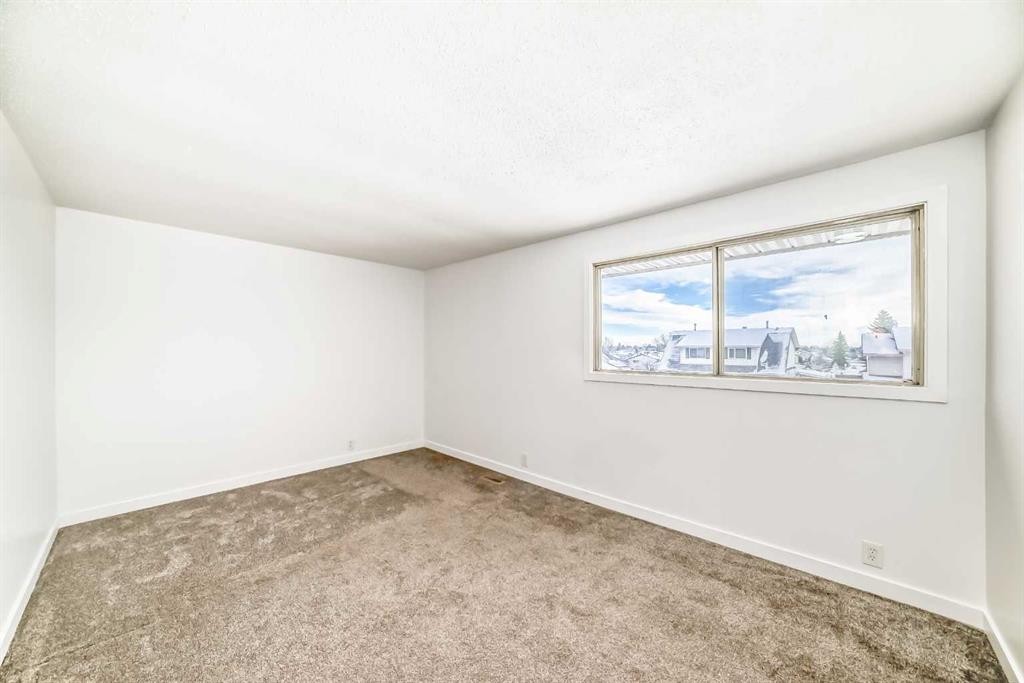 51A Fonda Green Se, Calgary, AB - Indoor Photo Showing Other Room