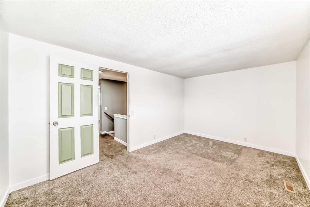 51A Fonda Green Se, Calgary, AB - Indoor Photo Showing Other Room