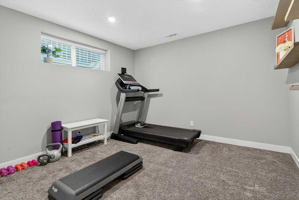 1091 Brightoncrest Green Se, Calgary, AB - Indoor Photo Showing Gym Room