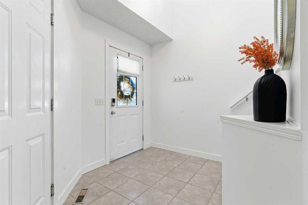 74 Evansbrooke Way Nw, Calgary, AB - Indoor Photo Showing Other Room