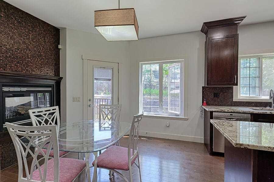 16 Rockcliff Point Nw, Calgary, AB - Indoor Photo Showing Dining Room