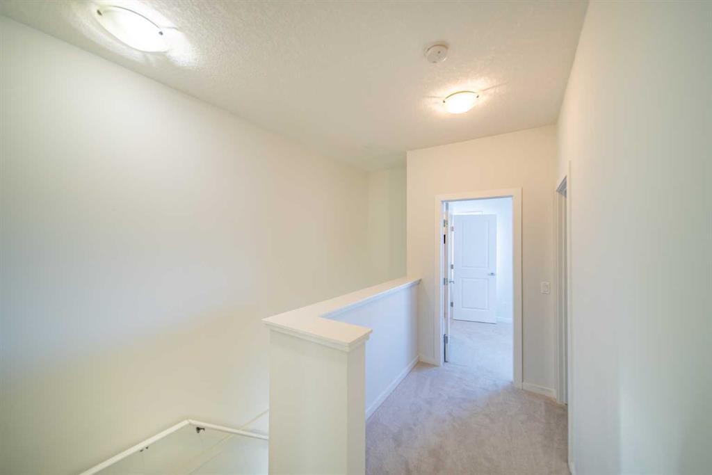 234 Cranston Way Se, Calgary, AB - Indoor Photo Showing Other Room