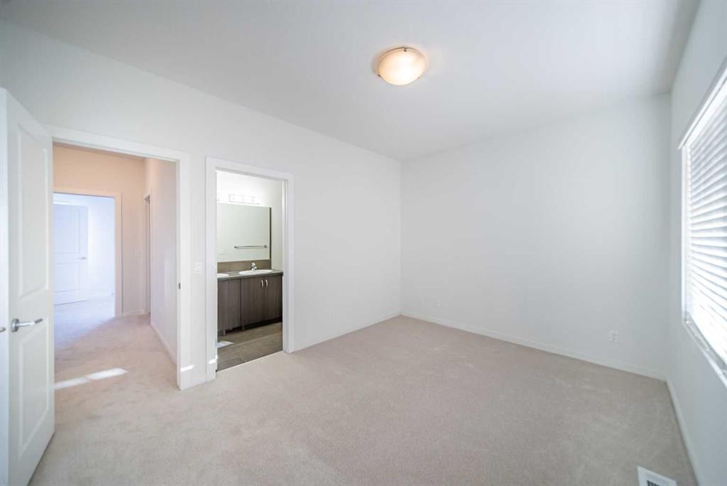 234 Cranston Way Se, Calgary, AB - Indoor Photo Showing Other Room