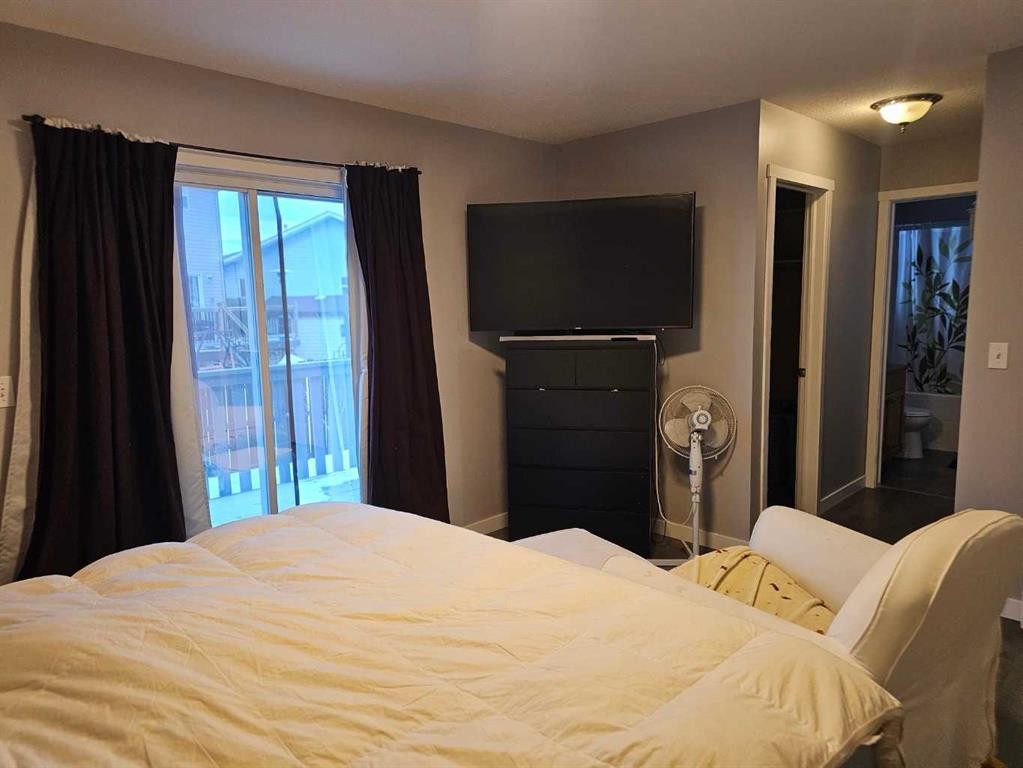 1808 Strathcona Bay, Strathmore, AB - Indoor Photo Showing Bedroom