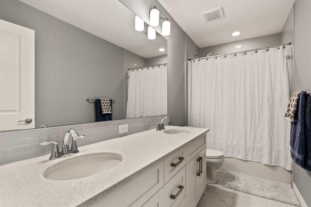 313 Evansglen Drive Nw, Calgary, AB - Indoor Photo Showing Bathroom