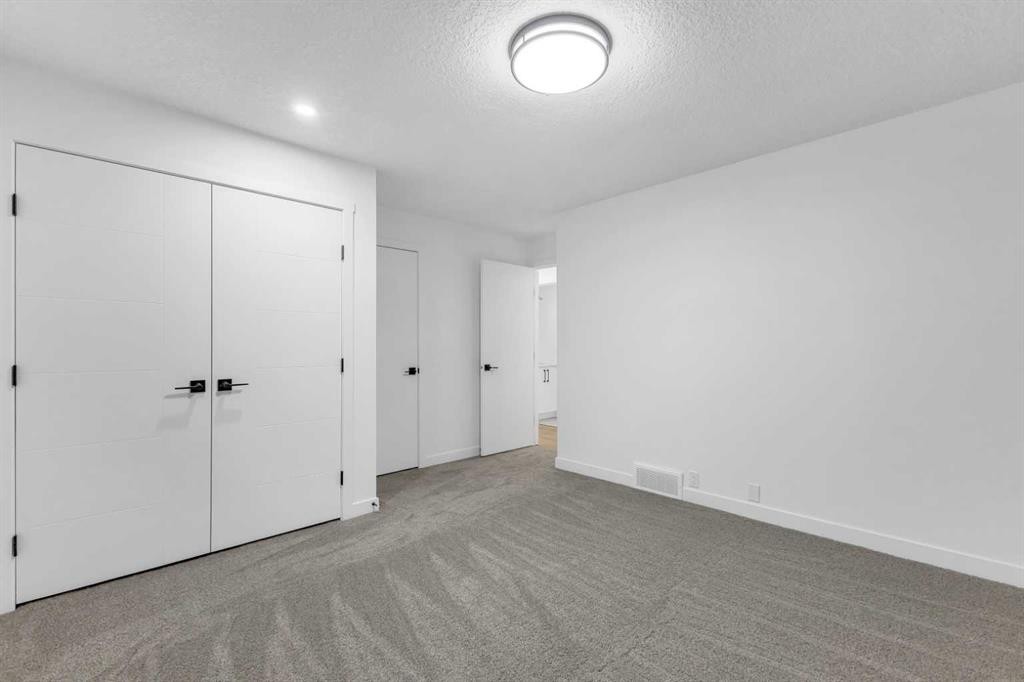 16 Faldale Close Ne, Calgary, AB - Indoor Photo Showing Other Room