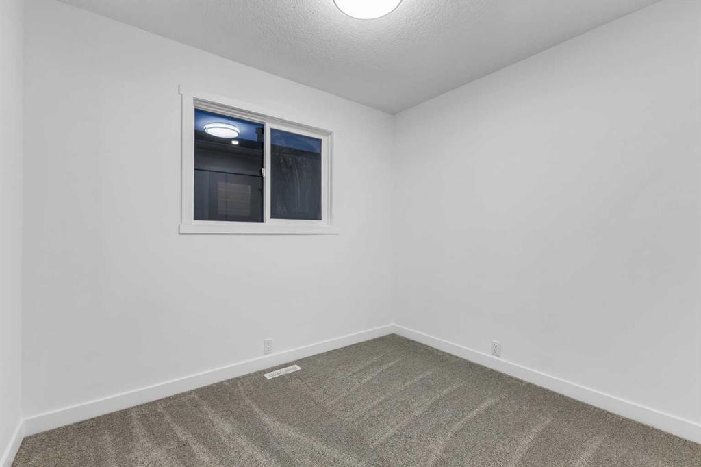 16 Faldale Close Ne, Calgary, AB - Indoor Photo Showing Other Room