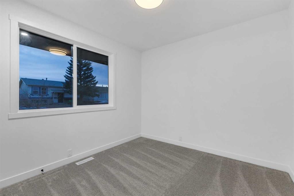 16 Faldale Close Ne, Calgary, AB - Indoor Photo Showing Other Room