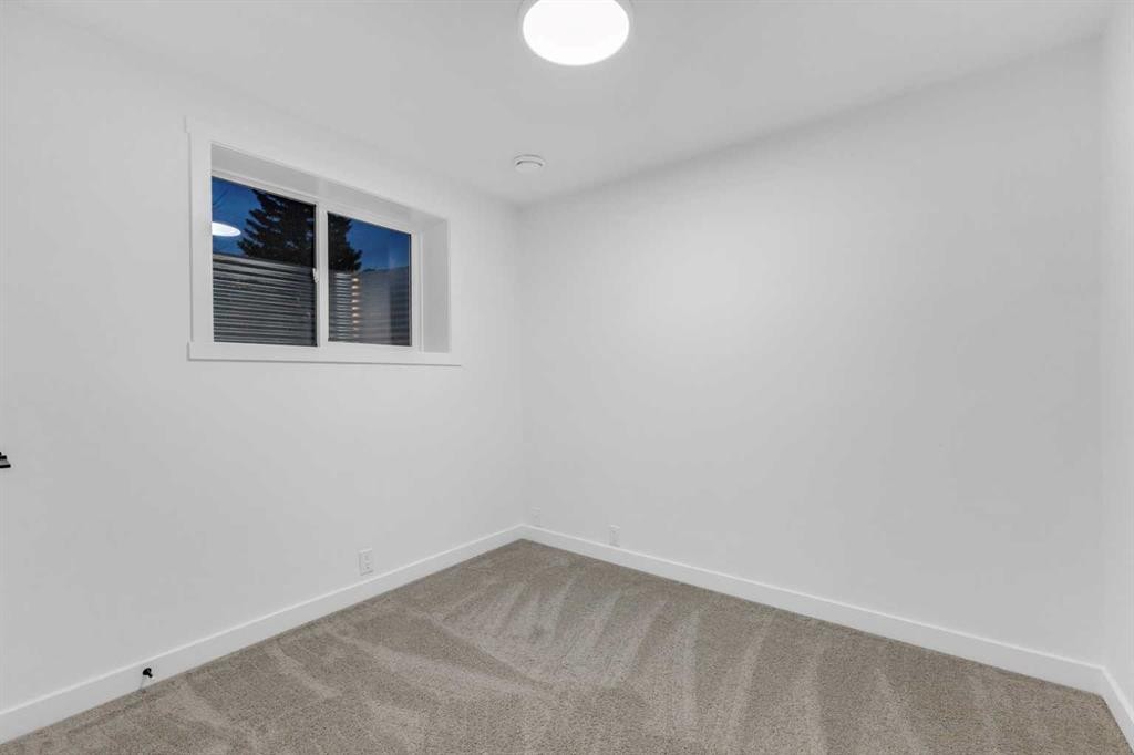 16 Faldale Close Ne, Calgary, AB - Indoor Photo Showing Other Room