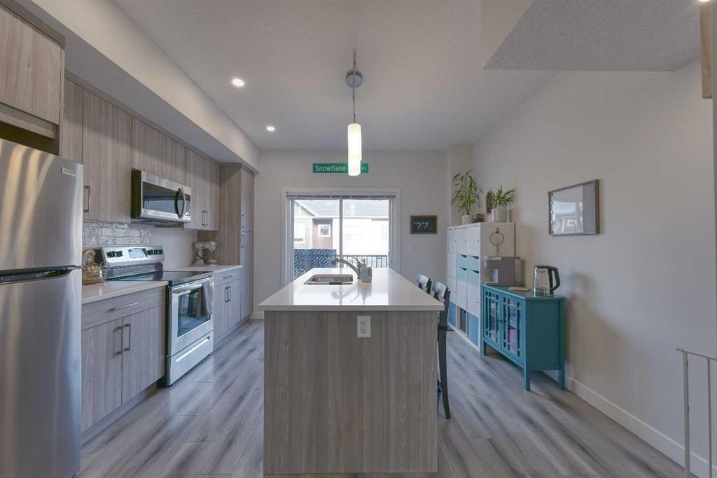 518 Canals Crossing, Airdrie, AB - Indoor Photo Showing Kitchen With Stainless Steel Kitchen With Upgraded Kitchen