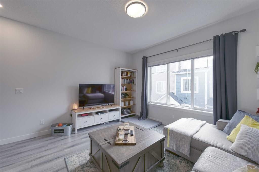 518 Canals Crossing, Airdrie, AB - Indoor Photo Showing Living Room