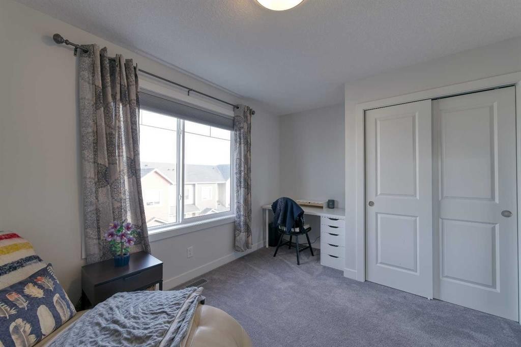 518 Canals Crossing, Airdrie, AB - Indoor Photo Showing Bedroom