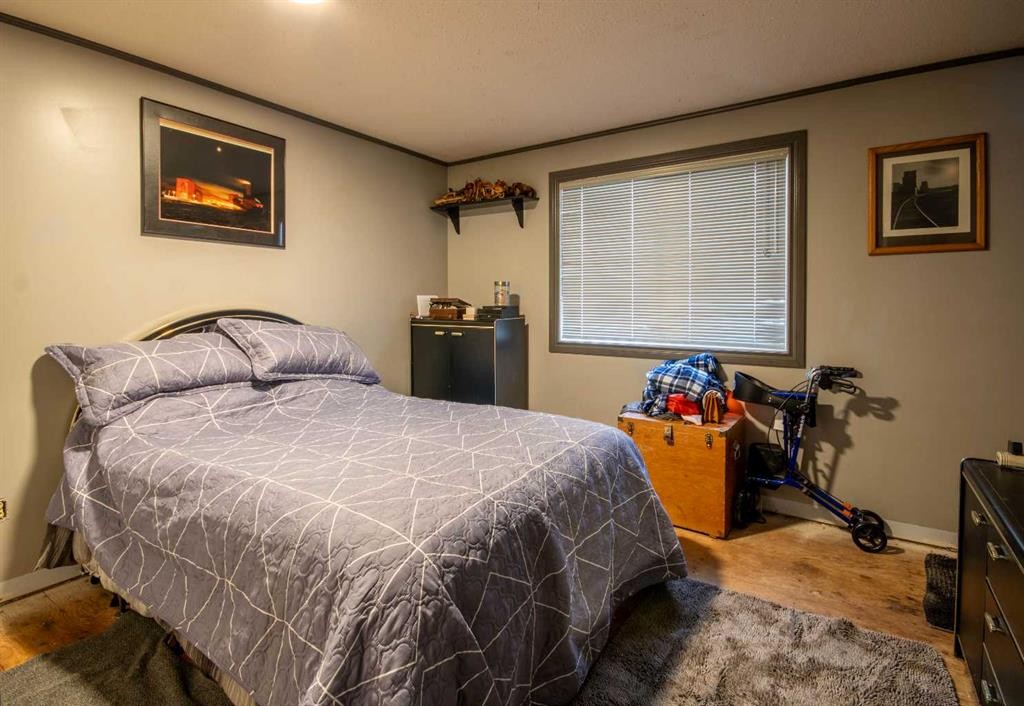 128 10 Avenue Ne, Sundre, AB - Indoor Photo Showing Bedroom