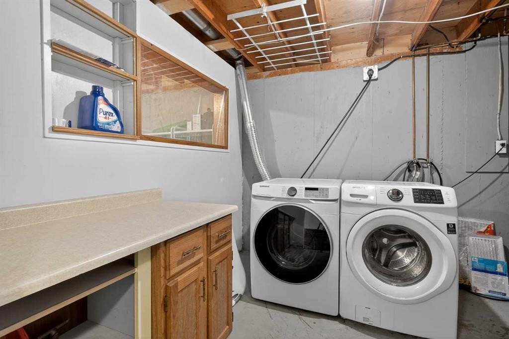68 Cedarwood Hill Sw, Calgary, AB - Indoor Photo Showing Laundry Room