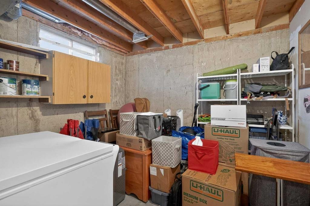 68 Cedarwood Hill Sw, Calgary, AB - Indoor Photo Showing Basement