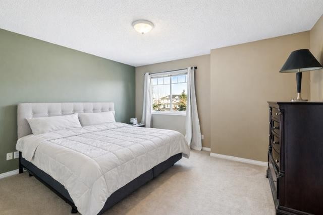 22 Country Hills Cove Nw, Calgary, AB - Indoor Photo Showing Bedroom