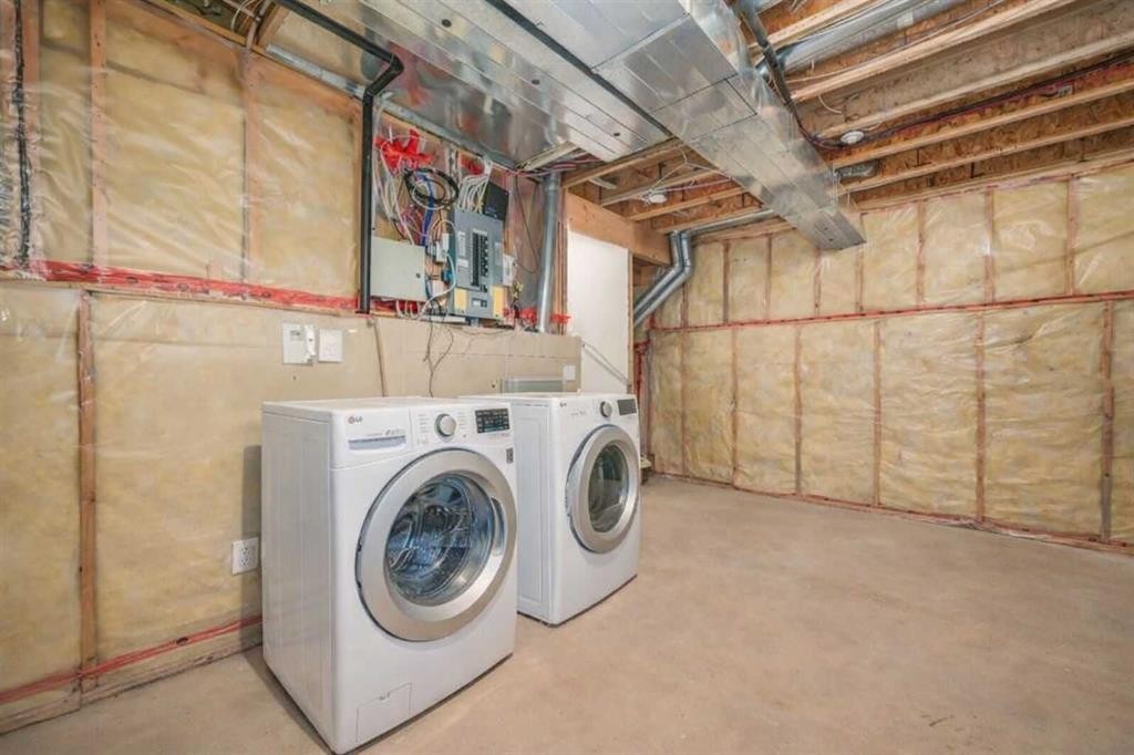 22 Country Hills Cove Nw, Calgary, AB - Indoor Photo Showing Laundry Room