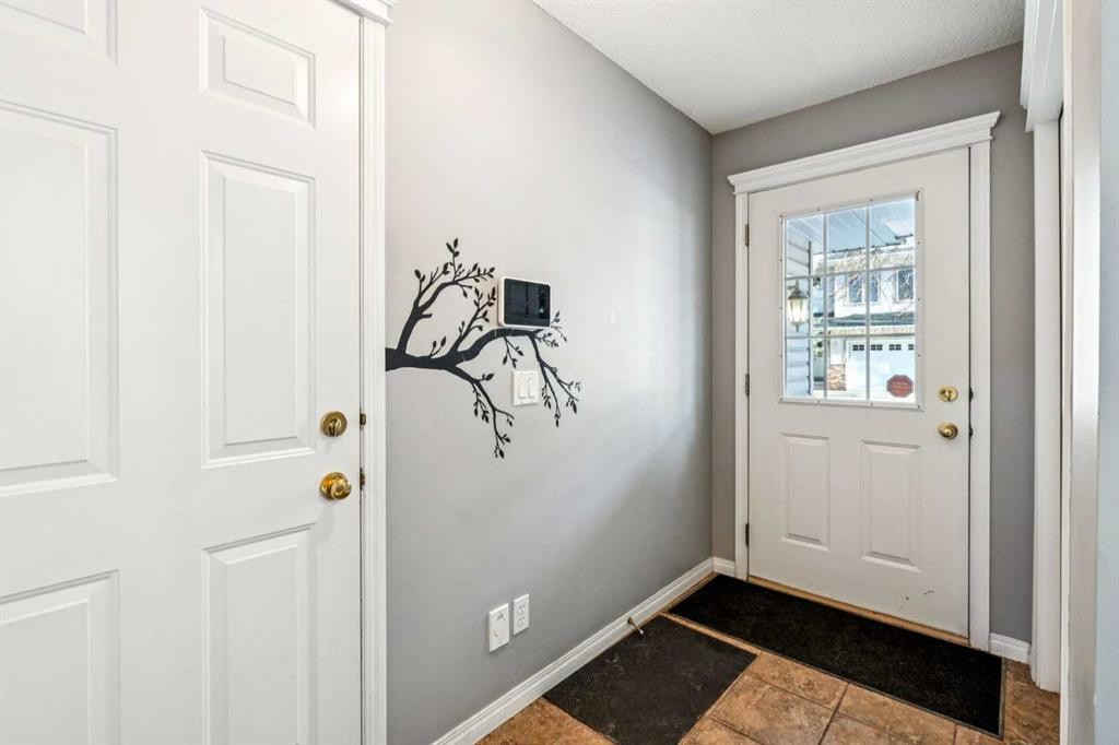 22 Country Hills Cove Nw, Calgary, AB - Indoor Photo Showing Other Room