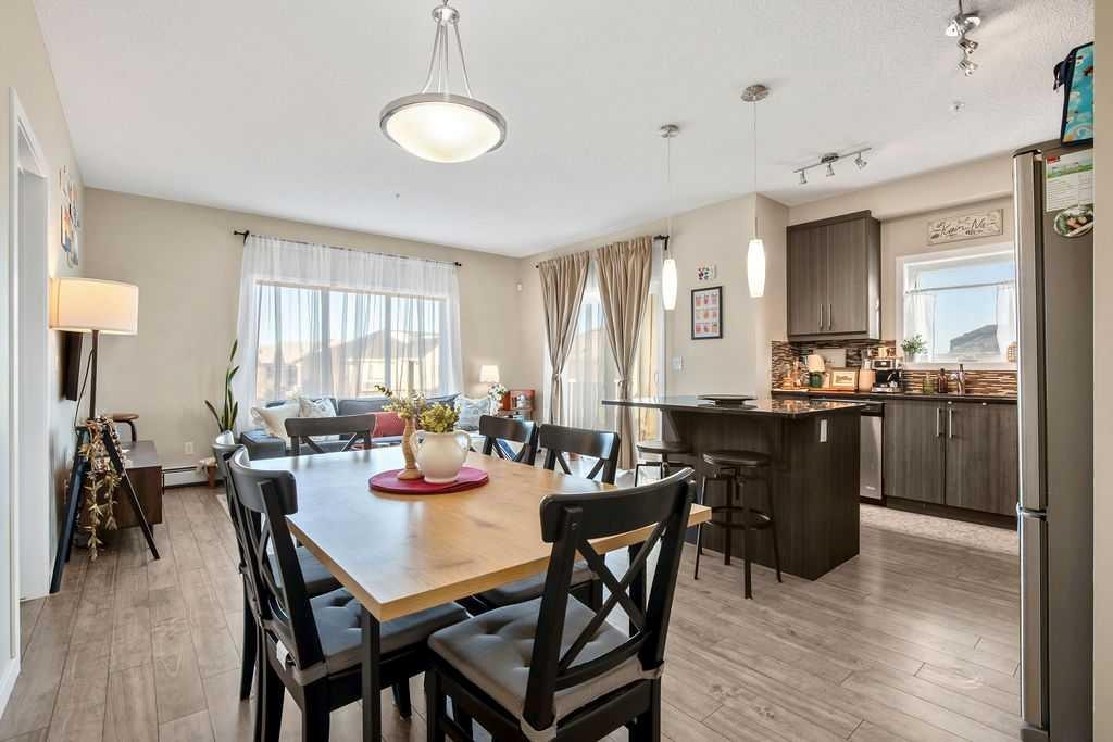 321-402 Marquis Lane Se, Calgary, AB - Indoor Photo Showing Dining Room
