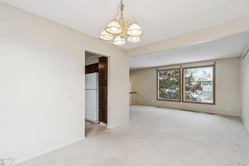 219 Silvercreek Close Nw, Calgary, AB - Indoor Photo Showing Other Room