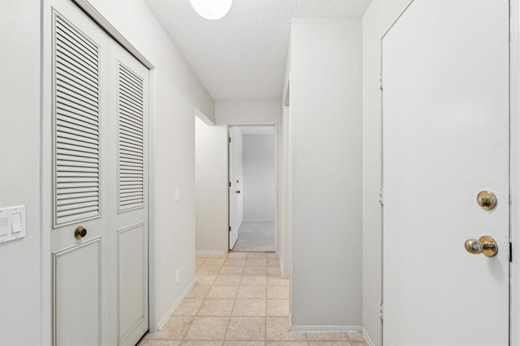 219 Silvercreek Close Nw, Calgary, AB - Indoor Photo Showing Other Room