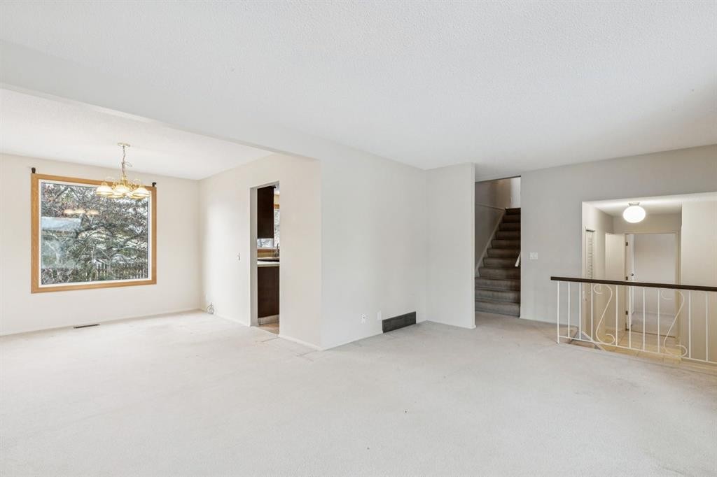 219 Silvercreek Close Nw, Calgary, AB - Indoor Photo Showing Other Room