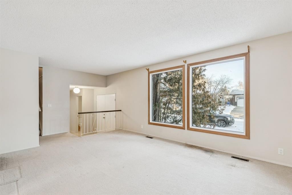 219 Silvercreek Close Nw, Calgary, AB - Indoor Photo Showing Other Room