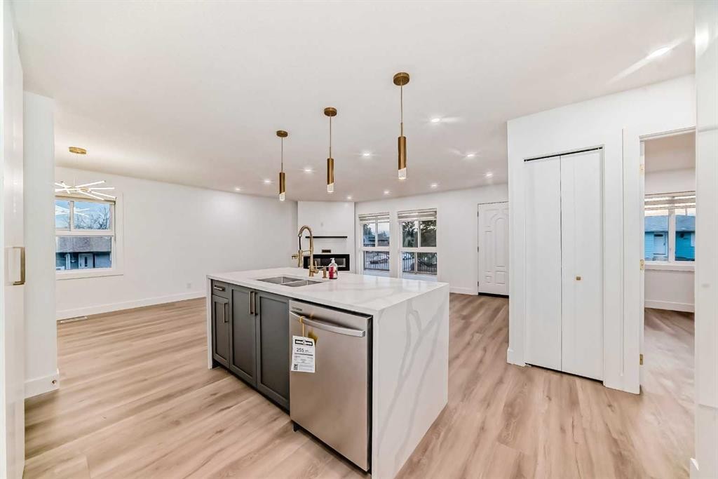 304 Huntbourne Hill Ne, Calgary, AB - Indoor Photo Showing Kitchen With Double Sink
