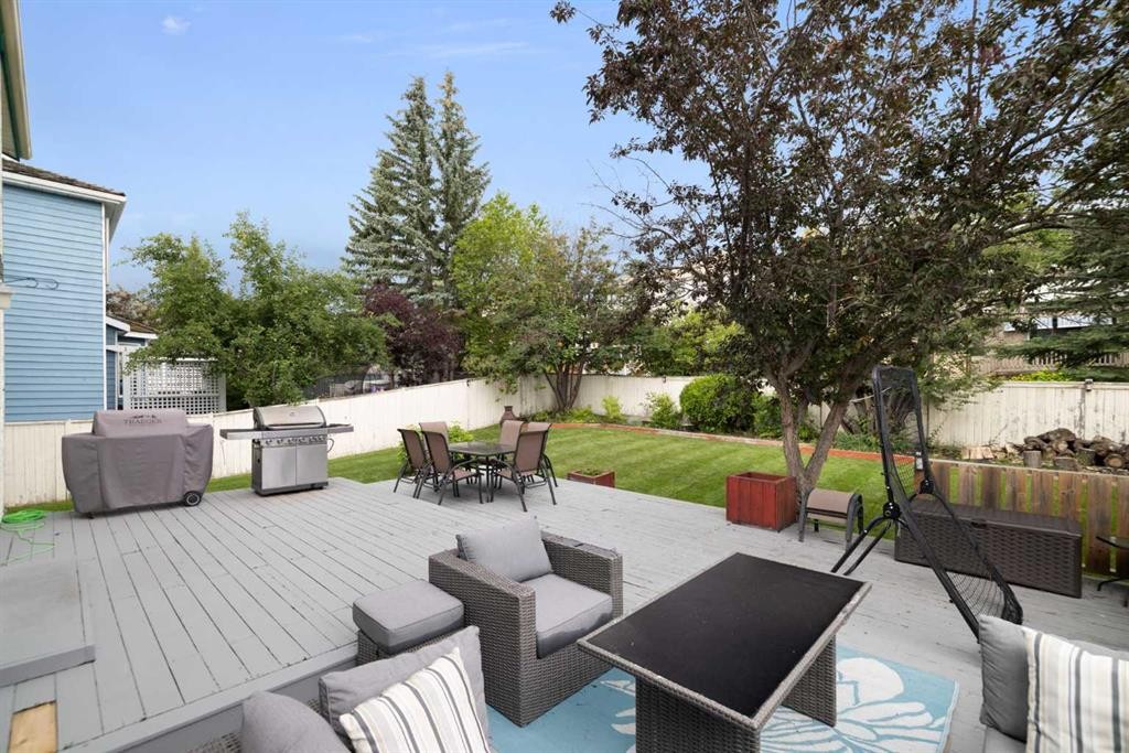 156 Woodfield Road Sw, Calgary, AB - Outdoor With Deck Patio Veranda With Backyard