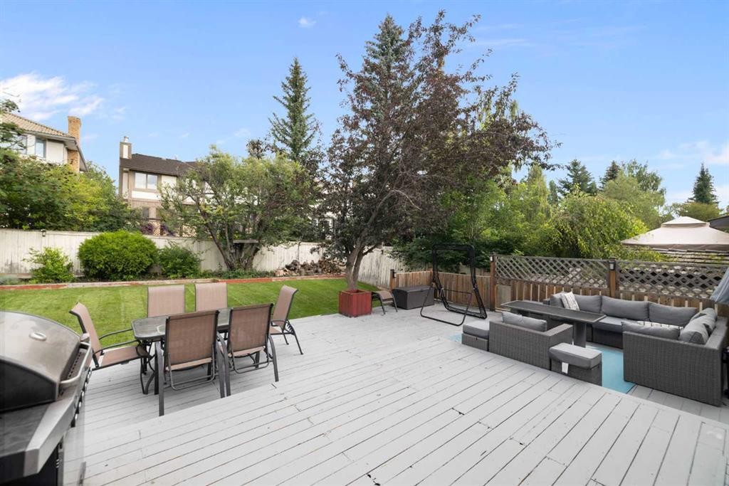 156 Woodfield Road Sw, Calgary, AB - Outdoor With Deck Patio Veranda