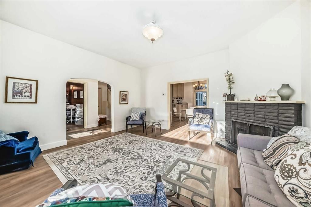 342 Superior Avenue Sw, Calgary, AB - Indoor Photo Showing Other Room With Fireplace