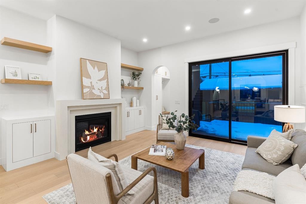 1904 48 Avenue Sw, Calgary, AB - Indoor Photo Showing Living Room With Fireplace