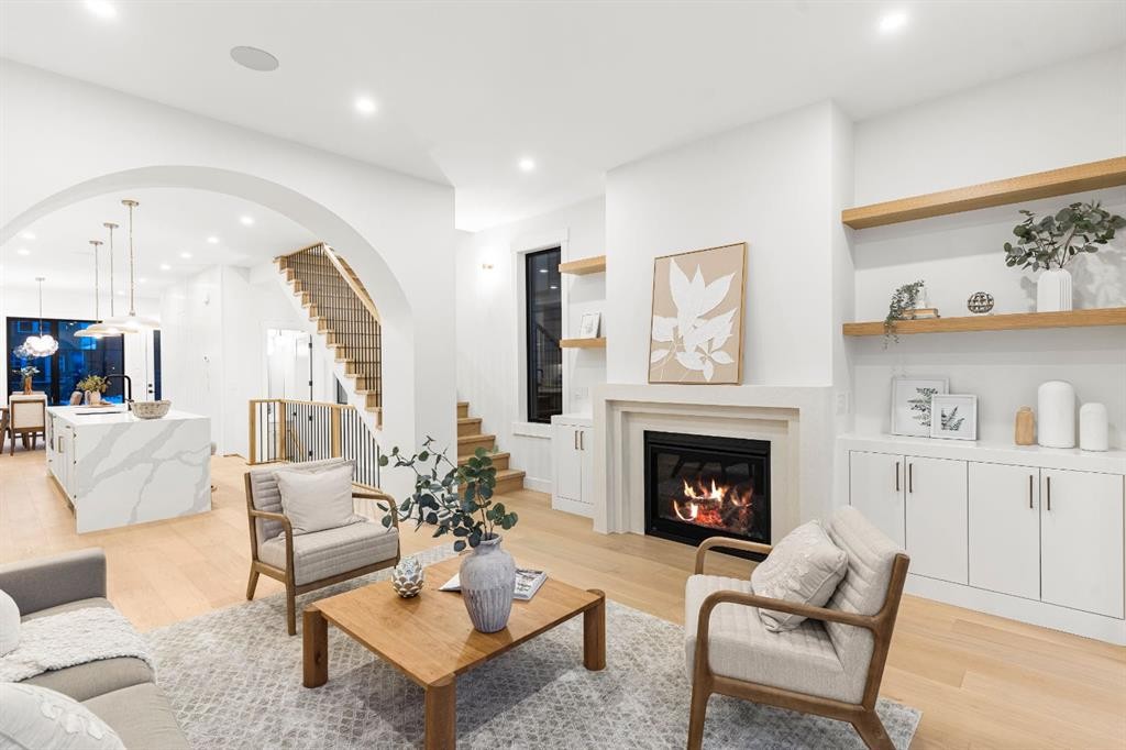 1904 48 Avenue Sw, Calgary, AB - Indoor Photo Showing Living Room With Fireplace