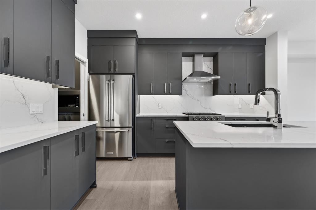 93 Walgrove Bay Se, Calgary, AB - Indoor Photo Showing Kitchen With Stainless Steel Kitchen With Upgraded Kitchen