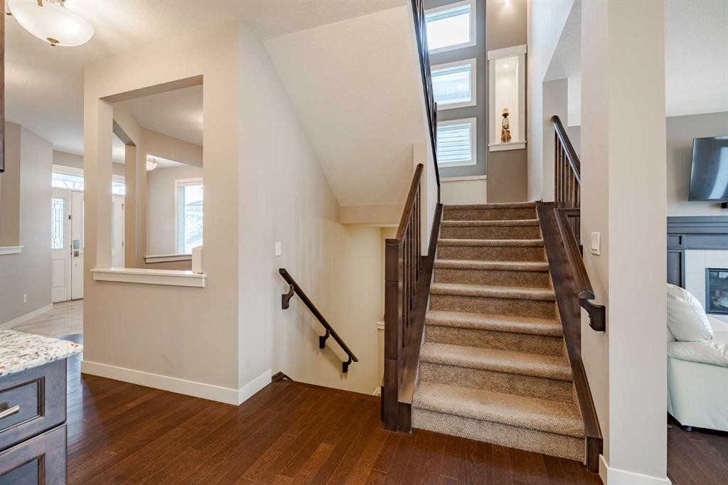 355 Evanston Way Nw, Calgary, AB - Indoor Photo Showing Other Room With Fireplace