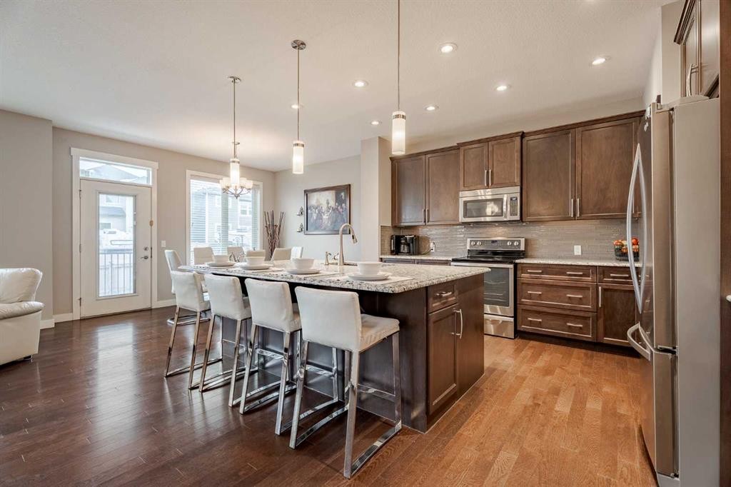 355 Evanston Way Nw, Calgary, AB - Indoor Photo Showing Kitchen With Upgraded Kitchen