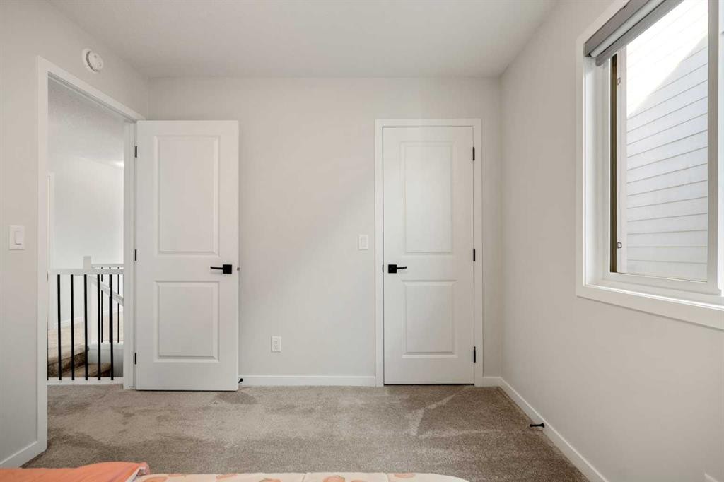 40 West Grove Link Sw, Calgary, AB - Indoor Photo Showing Other Room